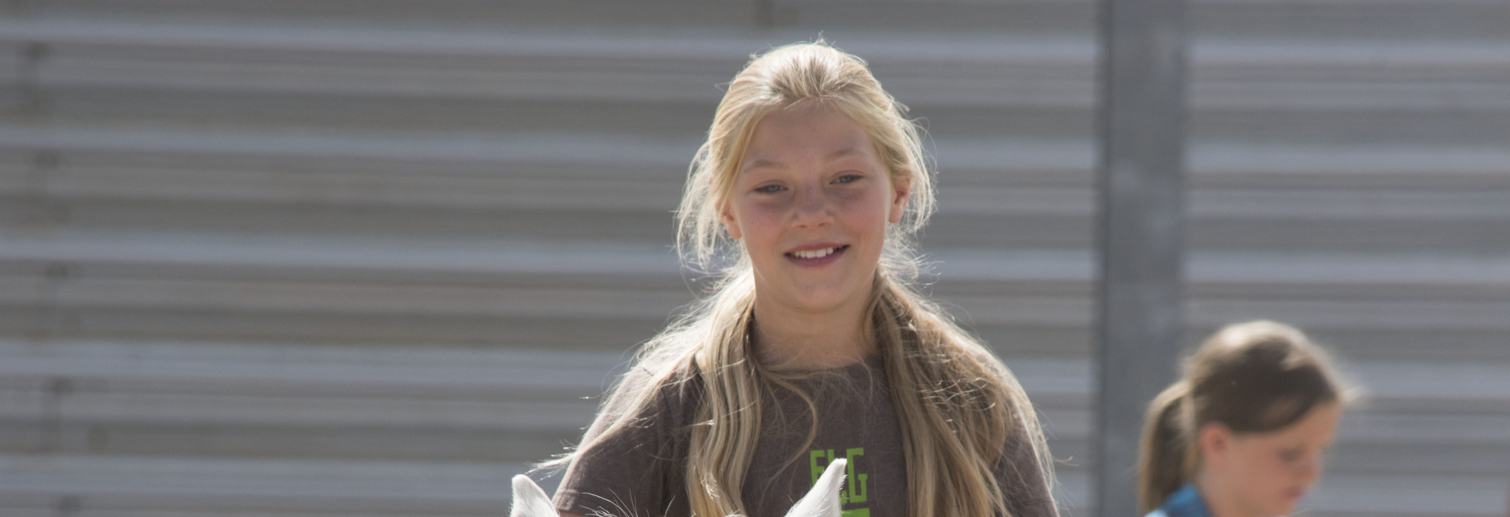 4-H'er is riding a horse