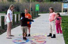 Kids play on the Mirror Me stencil.