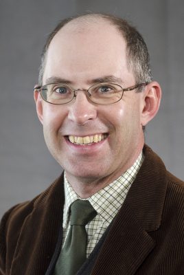 Photograph of man in suit and tie