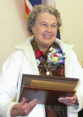 PHoto of women holding plaque