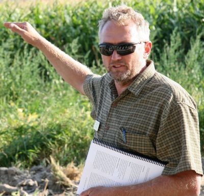 Photograph of man in field