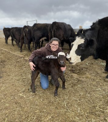 Student with a calf