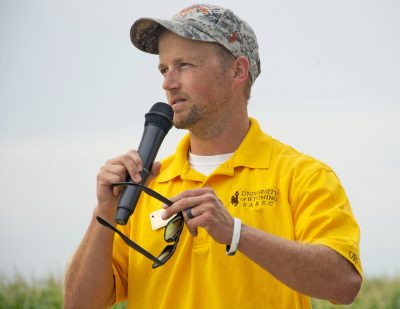 Photograph of man with microphone