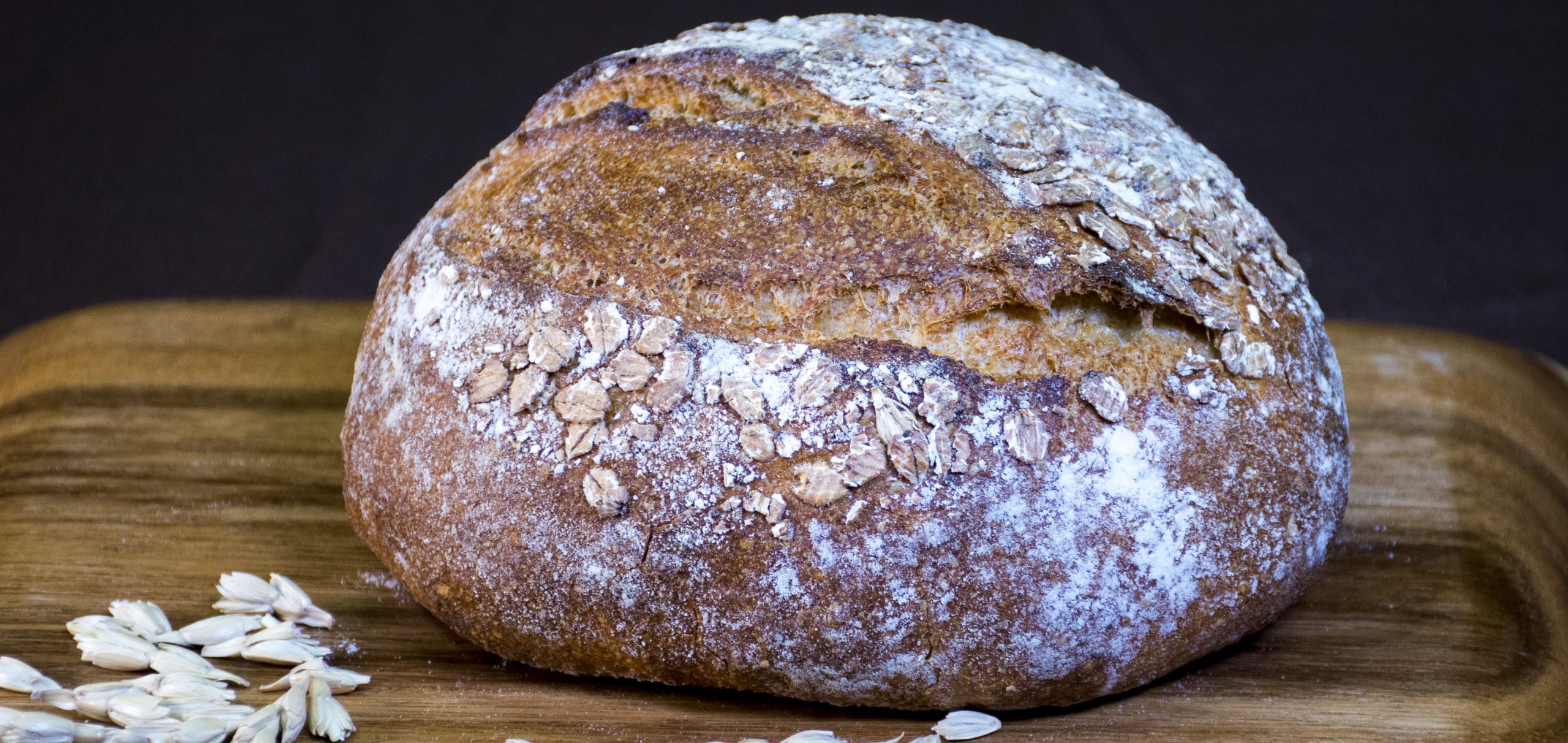 round bread loaf on wood cutting board