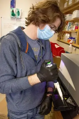 Student using test machine