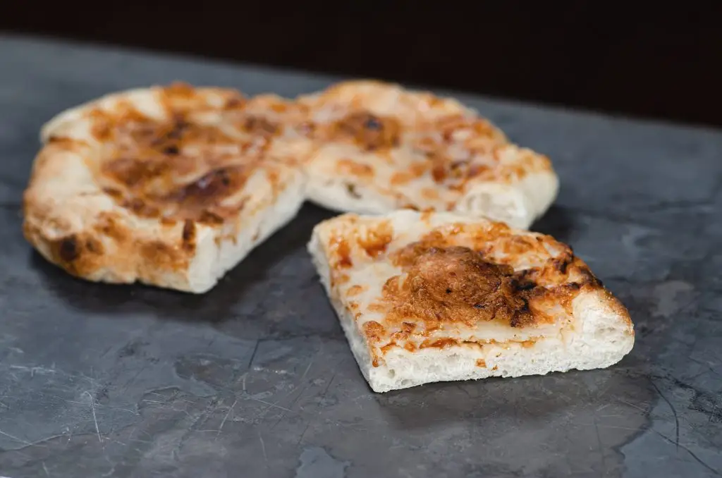 small cheese pizza made on high altitude artisan pizza crust