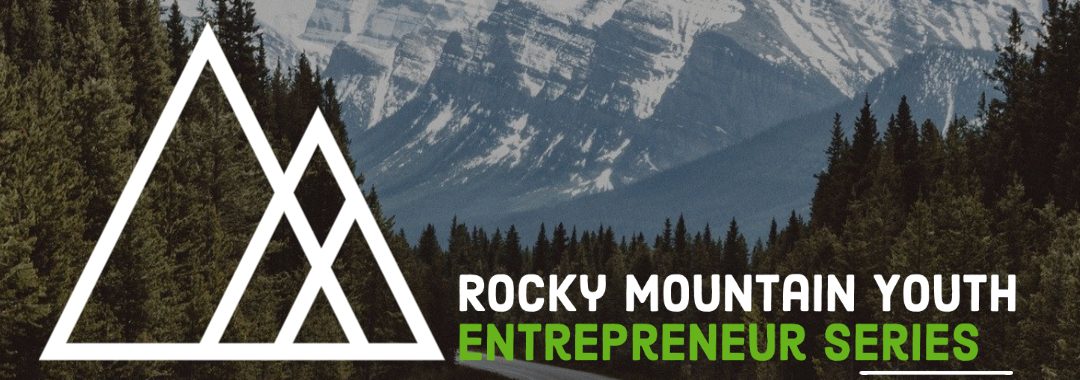 Snow capped mountains with mountain logo on top