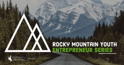 Snow capped mountains with mountain logo on top