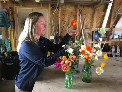 Brooke Seitz arranging flowers