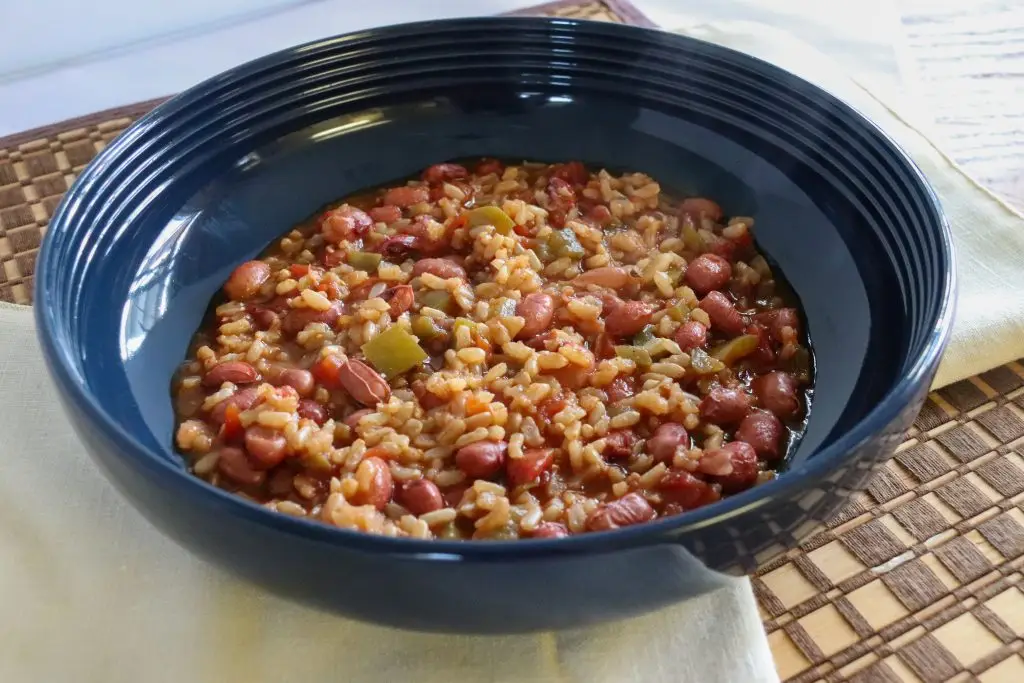 cobalt blue bowl filled with red beans and rice