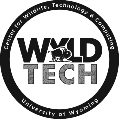 A logo of WYLDTECH in black and white. A circle encompasses the words "Wyld Tech", which also contain a stylized bison. On the circle, the words "Center for Wildlife, Technology and Computing - University of Wyoming" are written. 