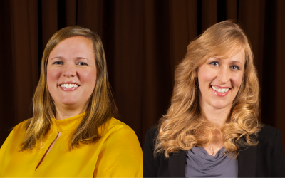 On the left, a woman with shoulder length straight blonde hair wearing a yellow blouse. On the right, a woman with wavy shoulder length blonde hair wearing a gray shirt and black jacket.