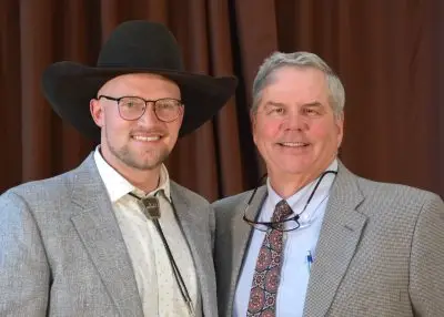Two men in formal clothing. 