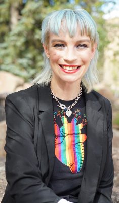 A woman with pale blue hair.