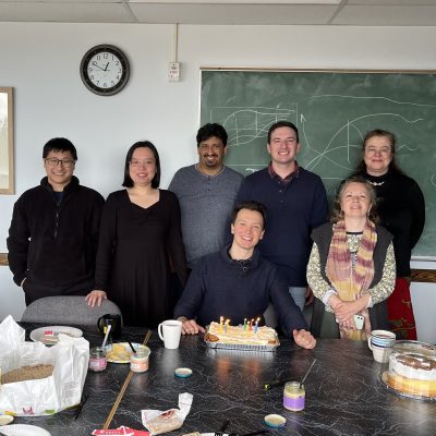 A group of people smiling.