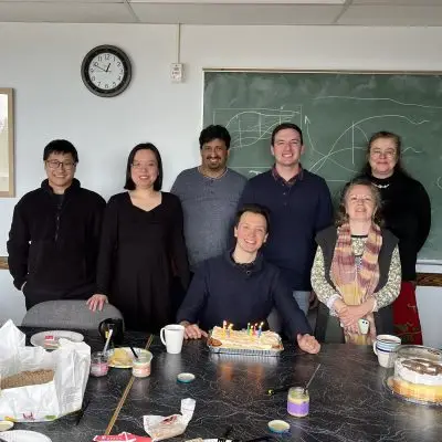 A group of people smiling.