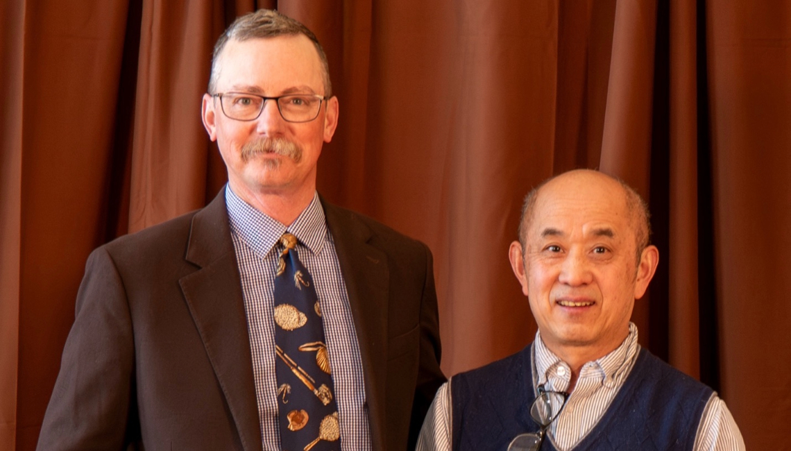 Interim WAES Director Brian Mealor with Zhaojie Zhang.