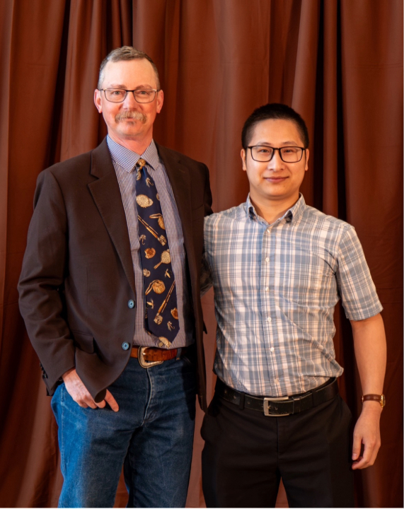 Interim WAES Director Brian Mealor with Kiet Tran.