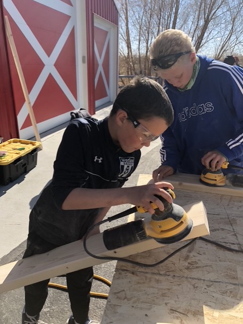 Brenden Marcus and Kyston Rollema of the Roadrunners 4-H club participate in a Sleep in Heavenly Peace bed build. Photo by Cindy Lentsch.