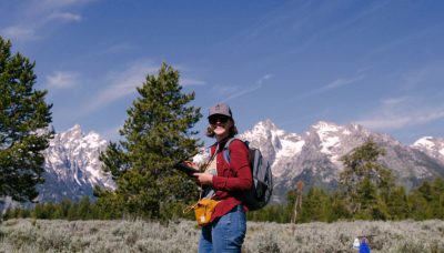 Amy Storey, a University of Wyoming third-year master’s student in zoology and physiology, completes a field survey for a collection site in Grand Teton National Park. This included taking habitat measurements about the floral and bee community as well as collecting environmental data, such as wind speed and land use. Storey’s presentation, titled “Parasites and Bumble Bee Decline in Wyoming,” was named the winning entry for a master’s student at the Wyoming Chapter of the Wildlife Society meeting in Sheridan April 8. (Rebecca Armentrout Photo)