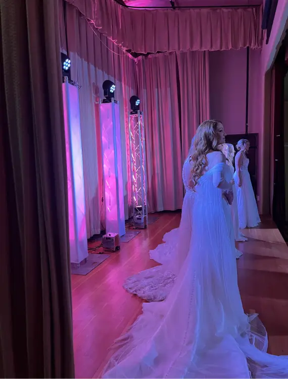 Models at the 2026 Cheyenne Bridal Expo present a variety of wedding gowns. Nichols prepared dresses, directed models, and ensured the four mini fashion shows ran smoothly. Photo by Izzy Nichols.