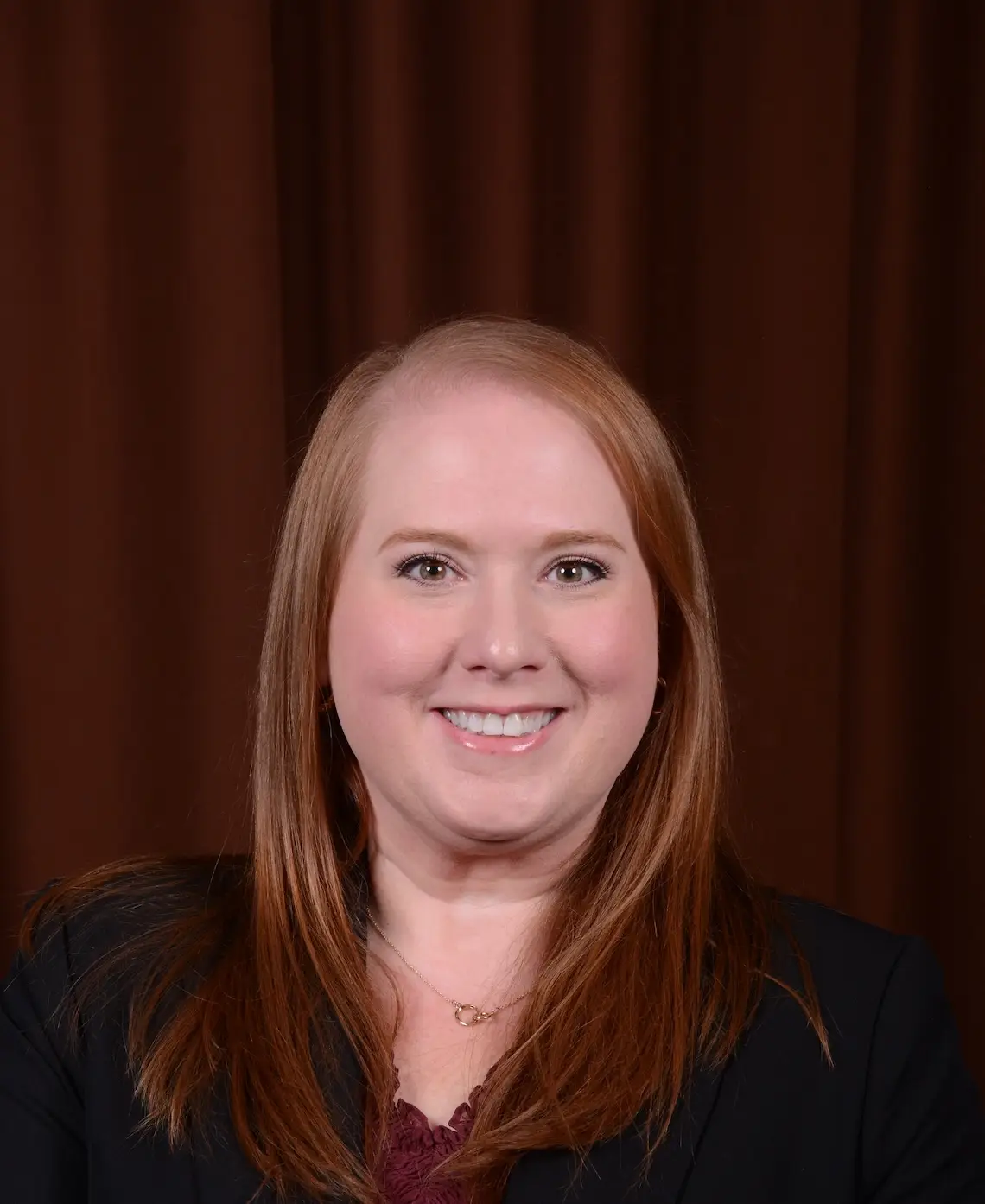 A portrait of Lindsay Baker.