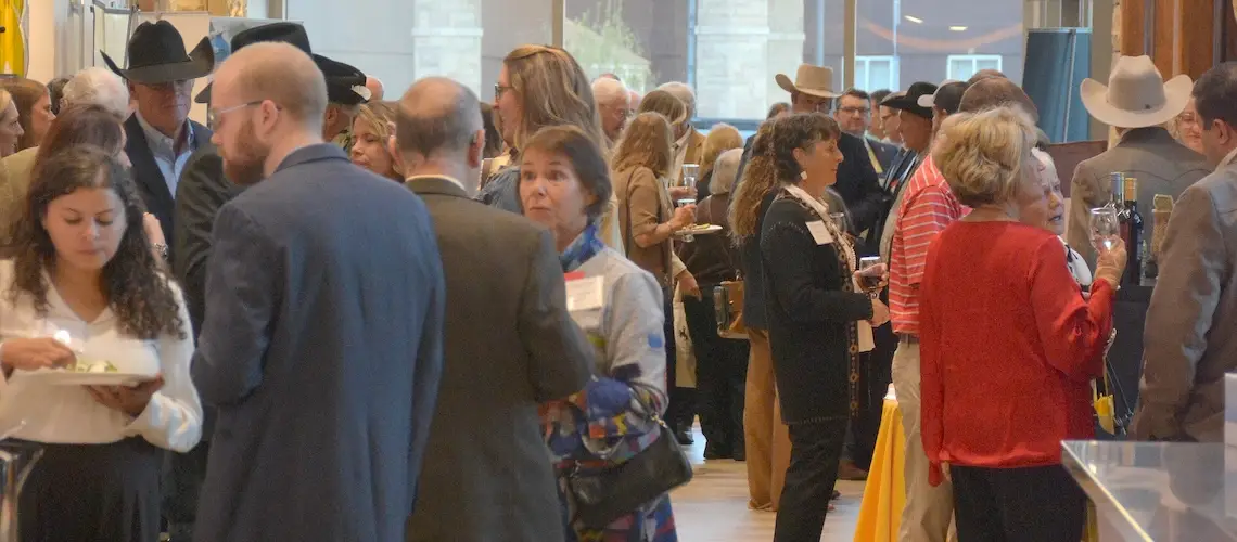 Participants mingle at the 2026 Dean’s Legacy Dinner.